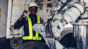 Aircraft technician inspecting landing gear components