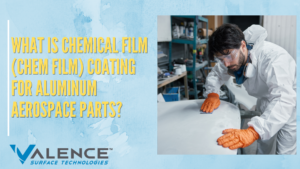 Technician applying chem film coating to aluminum part